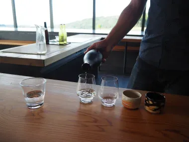 Iwa 5 being poured for a tasting in "The Doma"