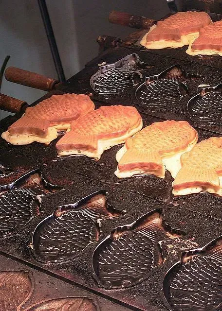 Taiyaki cooking in their fish-shaped moods